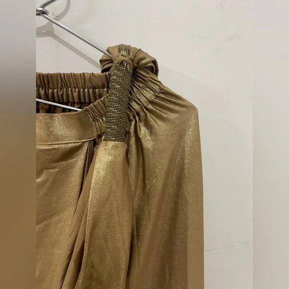 Stylish ready to wear designer saree with peplum black blouse and golden saree - Picture 8 of 9